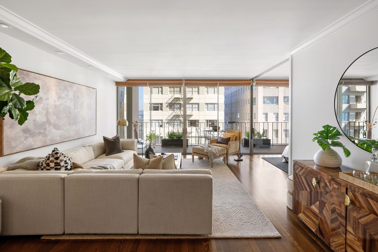 Elegant living room with bay views and balcony access