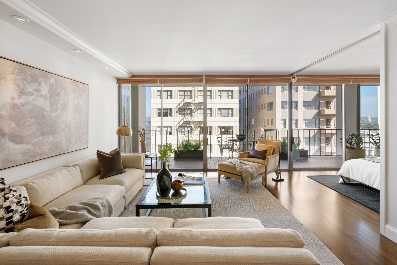 Living room with designer furnishings and natural light