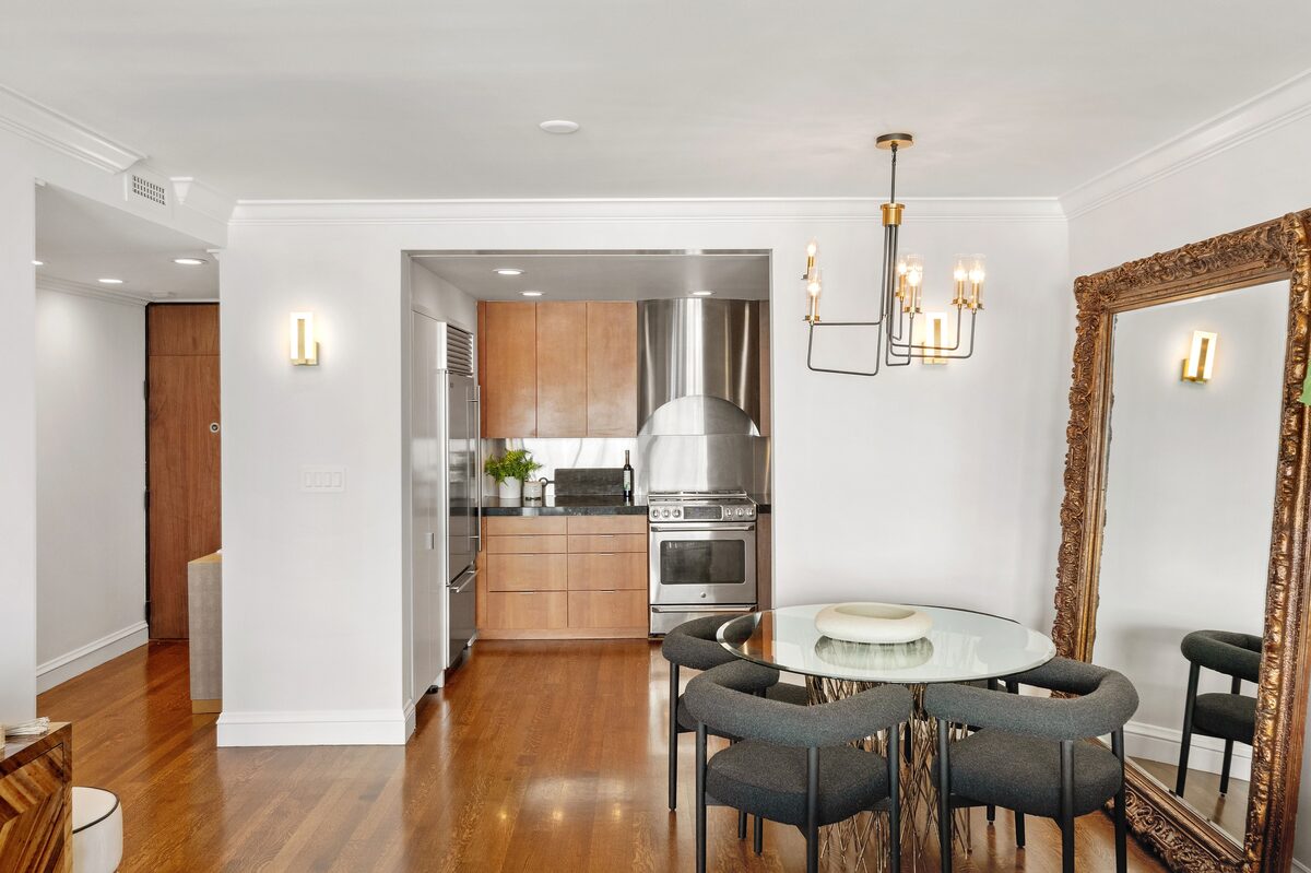 Kitchen opening onto elegant dining space